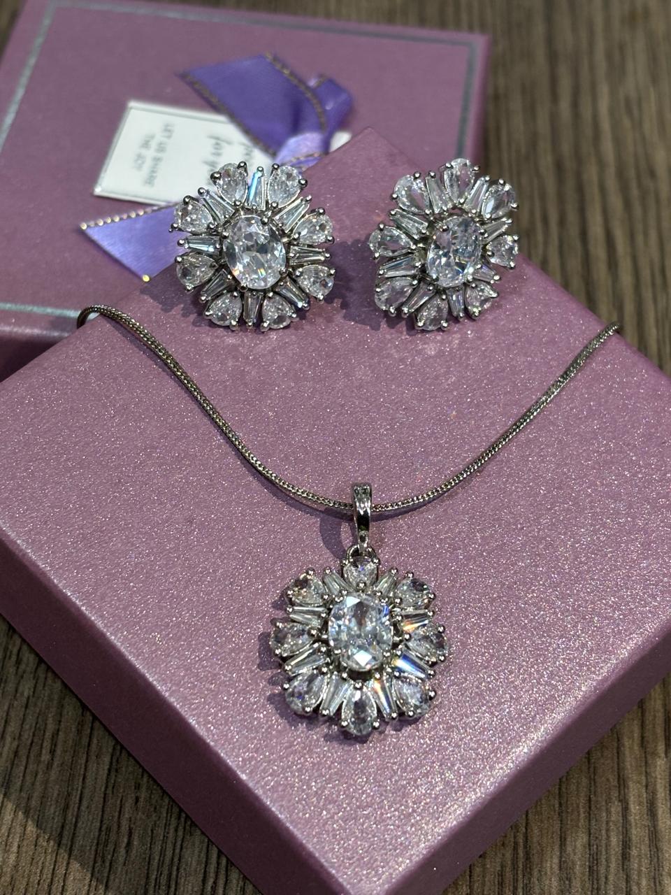 Shimmering graceful American diamond pendant set with chain